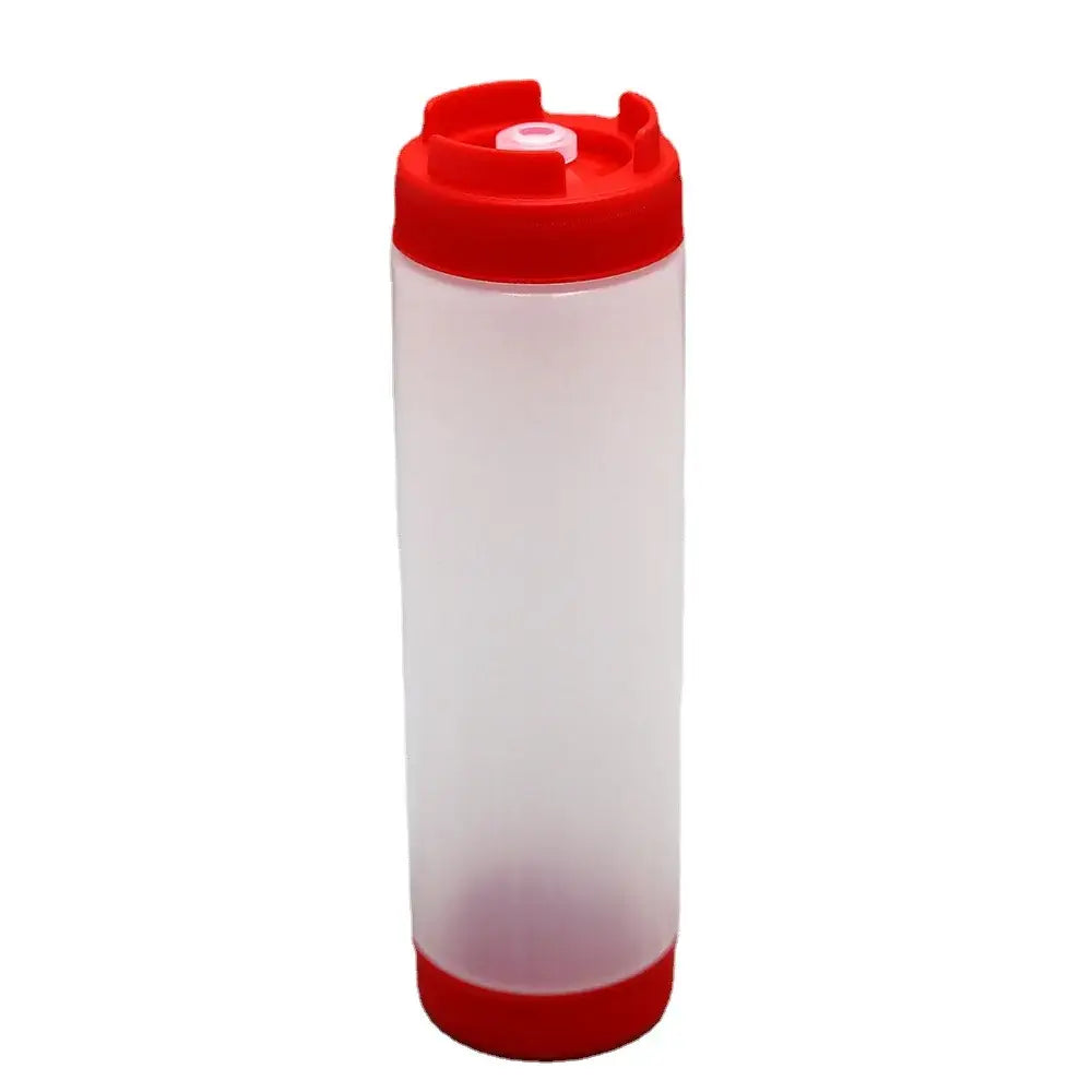 Transparent plastic tomato squeeze bottle with red cap base and white nozzle for kitchen use in clear red white yellow set