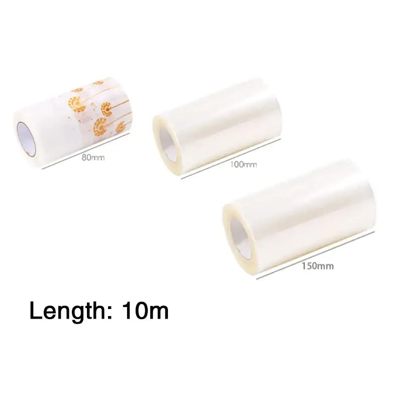 Three clear transparent adhesive tape rolls including one with gold floral pattern for decorbites cake edge wrap mousse decorating tool