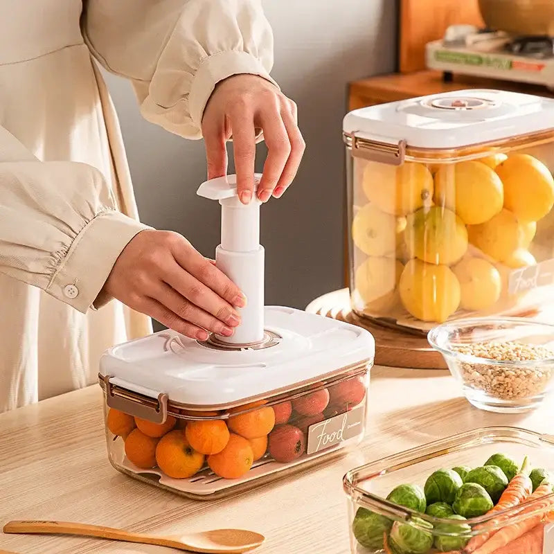 White plastic fresh-keeping vacuum canister with transparent container and gold-toned latch by decorbites vacuum canister