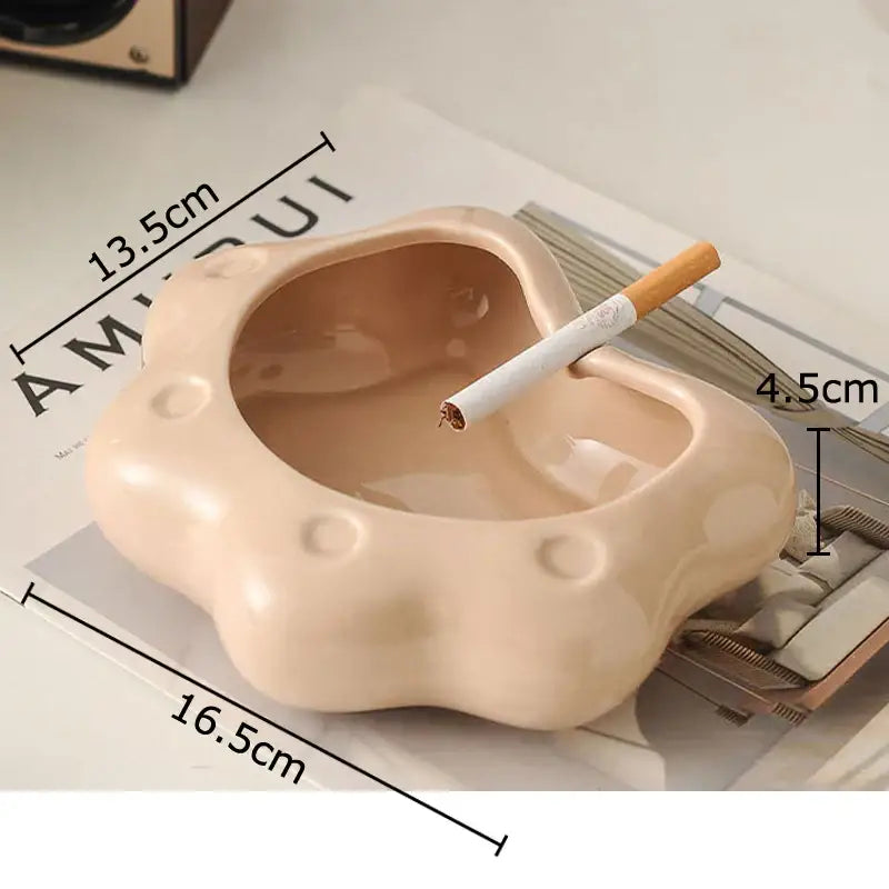 Beige ceramic cloud cat paw porcelain ashtray with rounded shape and circular indentations for living room decorbites cat paw gift