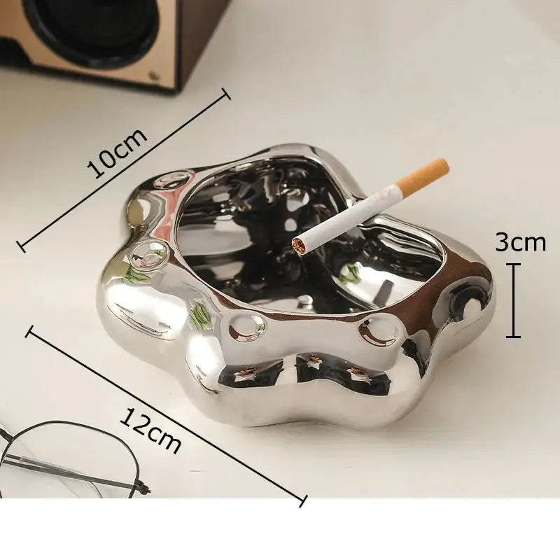 Shiny metallic cat paw porcelain ashtray with smooth reflective surface and rounded edges for decorbites cat paw gift