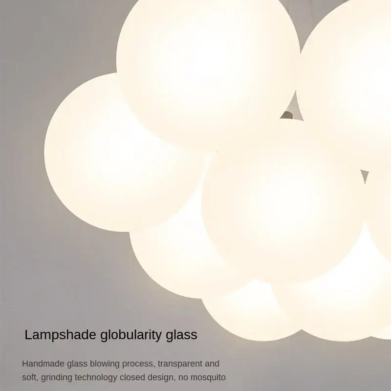 A modern cloud glass ball led pendant light made of translucent white handmade glass for bedroom decorbites decor