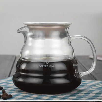 Clear glass coffee kettle with silver lid and measurement markings from decorbites cloud glass for precise brewing