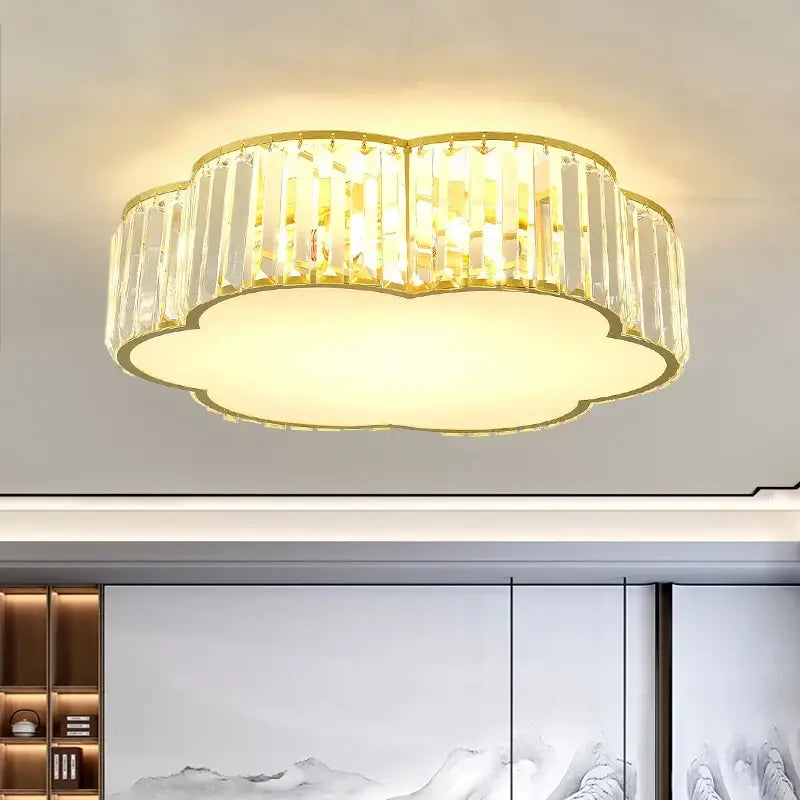 Gold-toned cloud shaped decorbites crystal zen ceiling light with clear prisms and warm diffused glow for living room