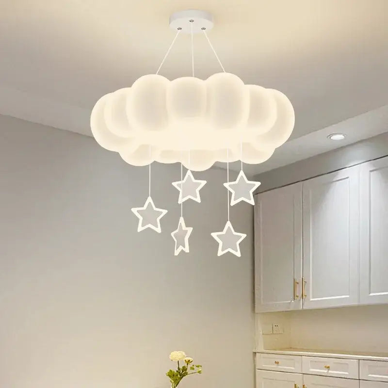 A soft white cloud shaped pendant light with five glowing stars by decorbites dimming pendant for living room decor