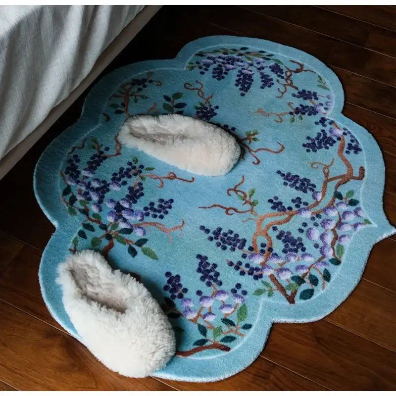 Light blue cloud shaped door mat with embroidered purple and green wisteria grape vine chinoiserie decorbites design