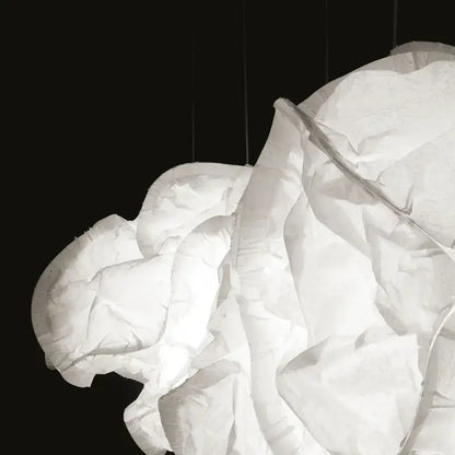 A sculptural cloud white pendant light with soft organic folds made of rice paper for kitchen decorbites cloud white