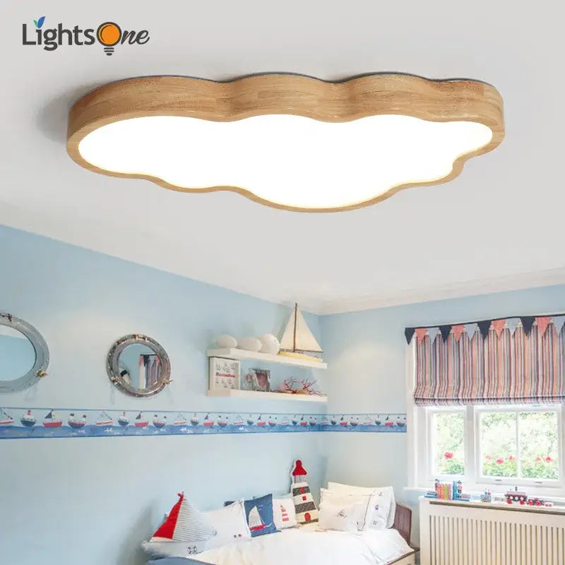 Cloud wood ceiling light with natural wood frame and soft white illuminated surface for children’s room decorbites ceiling light