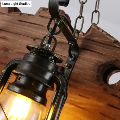 Lámpara de araña costera negra de queroseno con cristal transparente y figura de pez de madera - 6 luces para iluminación colgante de restaurantes