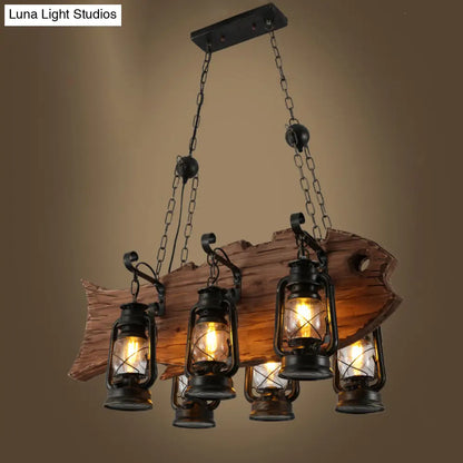 Lámpara de araña costera negra de queroseno con cristal transparente y figura de pez de madera - 6 luces para iluminación colgante de restaurantes