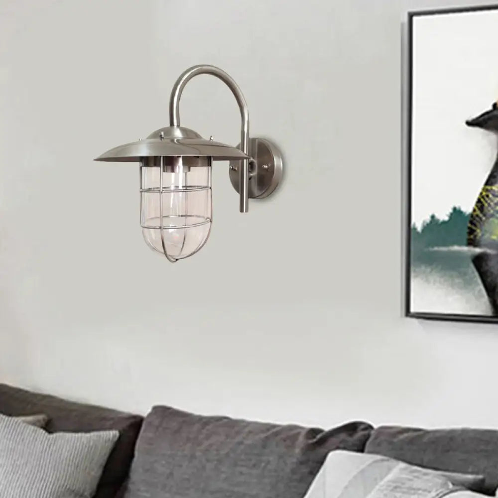 Lámpara de pared tipo jaula en negro/níquel estilo costero con bombilla de cristal transparente para sala de estar