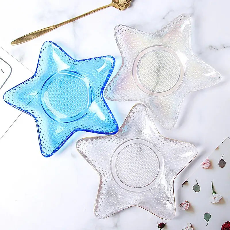 Coastal blue glass seashell dish plate saucer set featuring blue and clear star-shaped textured dot surfaces