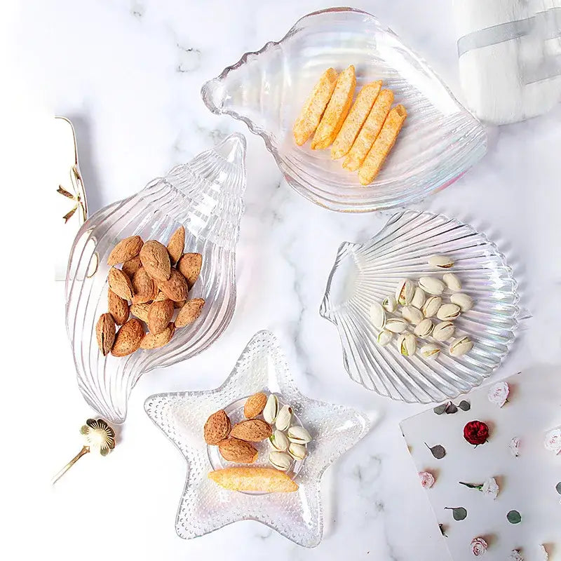 Clear glass seashell and star-shaped dish plate saucers with ribbed textures for dining and snacks