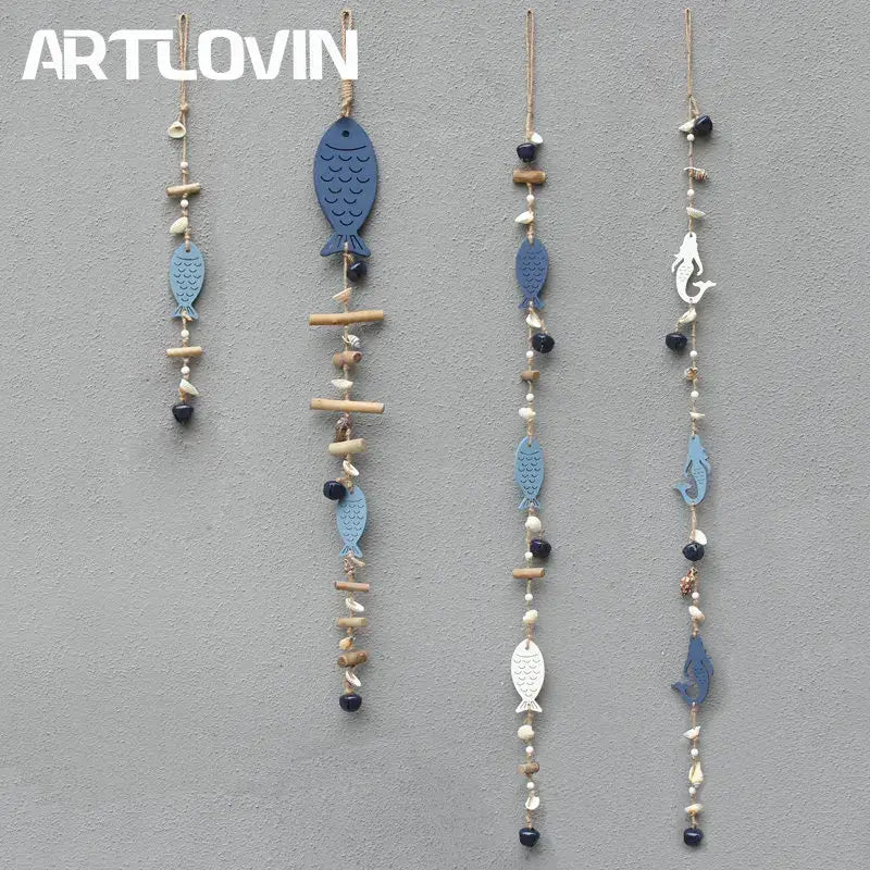 Coastal blue and white drift wood bells with painted wooden fish, shells, beads, and bamboo for living room wall decor