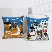 Two embroidered cushion covers with coastal chic greek architecture design in blue white and earth tones by decorbites coastal chic
