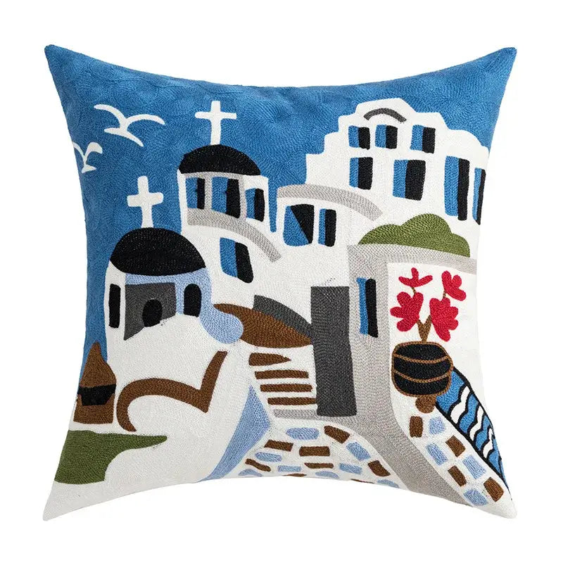 Blue and white cushion cover with coastal chic embroidered greek island scene for decorbites coastal chic living room decor