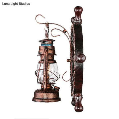 Coastal Clear Glass Kerosene Wall Sconce: Weathered Copper Bedroom Light Fixture with Wheel