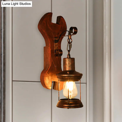 Coastal Clear Glass Lantern Sconce Light with Wooden Backplate - Rustic One-Light Fixture