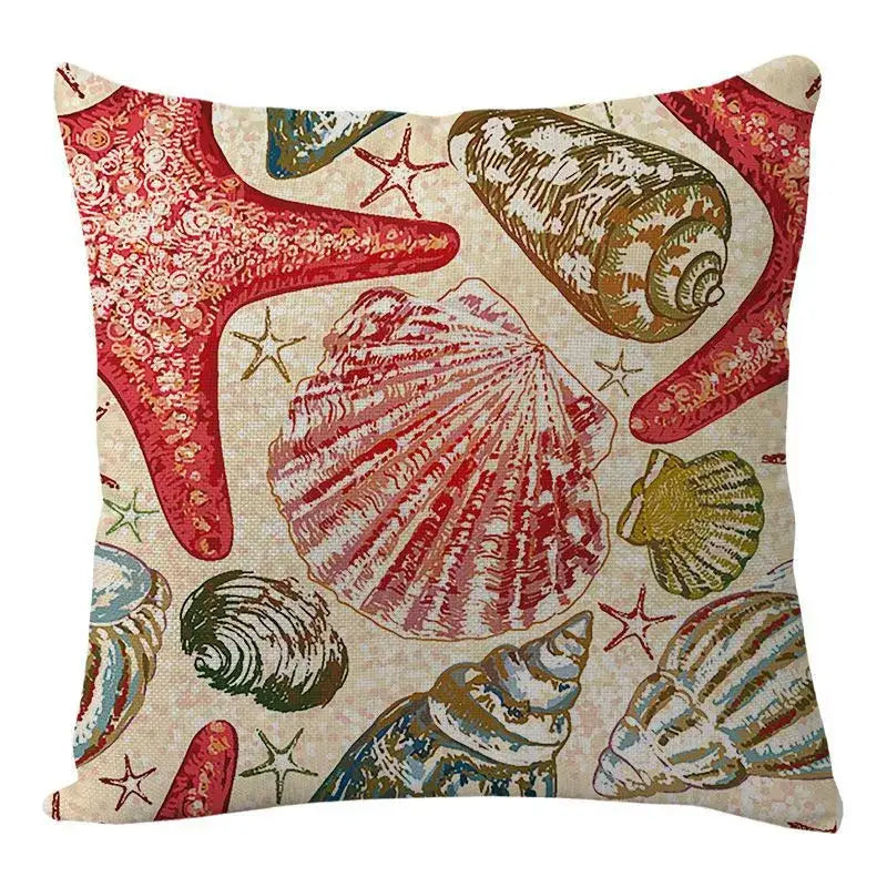 Beige decorbites coastal cushion with vibrant red green and blue seashell and starfish pattern for living room decor