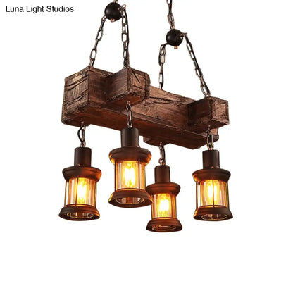 DecorBites™ Coastal Lantern Clear Glass Pendant 4-Light Island Light Fixture in Brown with Wood Accents