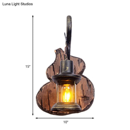 Coastal Lantern Wall Light Fixture, Antique Brass with Clear Glass Shade