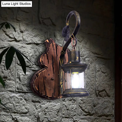 Coastal Lantern Wall Light Fixture, Antique Brass with Clear Glass Shade