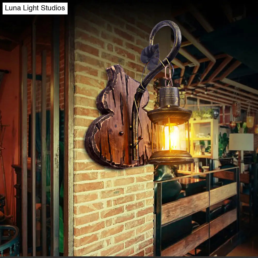 Coastal Lantern Wall Light Fixture, Antique Brass with Clear Glass Shade