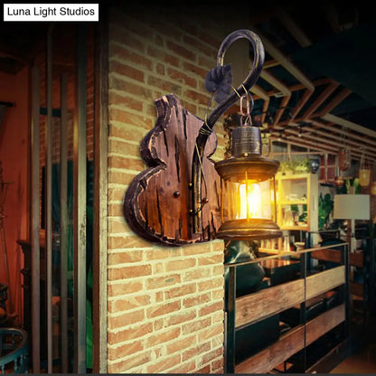 Coastal Lantern Wall Light Fixture, Antique Brass with Clear Glass Shade