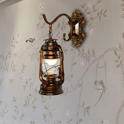 Coastal Living Room Wall Sconce - Clear Glass Light in Bronze Finish