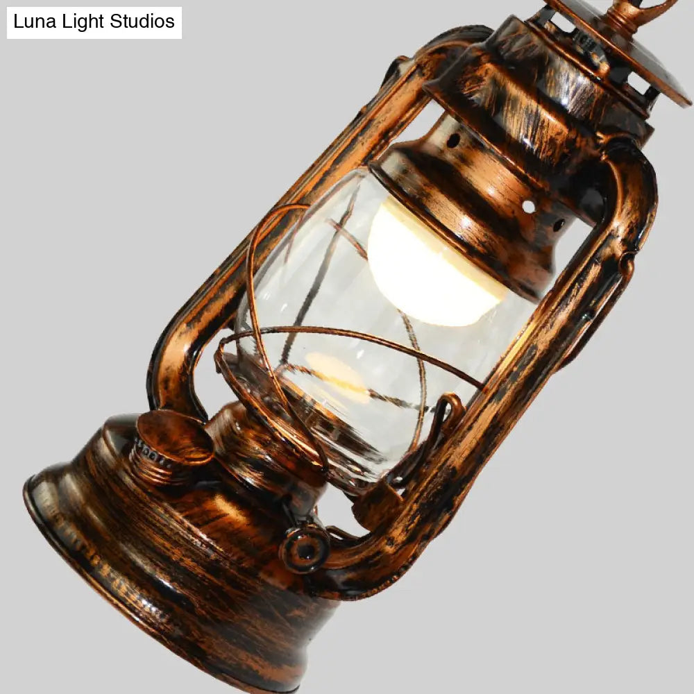 Coastal Living Room Wall Sconce - Clear Glass Light in Bronze Finish