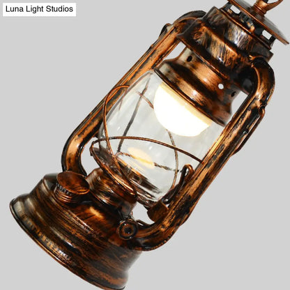 Coastal Living Room Wall Sconce - Clear Glass Light in Bronze Finish