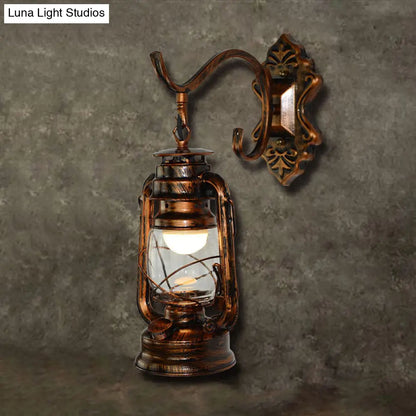 Coastal Living Room Wall Sconce - Clear Glass Light in Bronze Finish