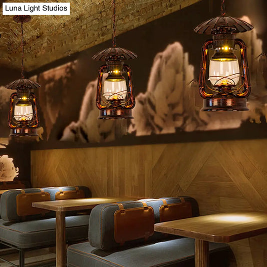 Lámpara colgante de metal de 1 cabezal para restaurante costero con pantalla de vidrio transparente para queroseno en latón/cobre