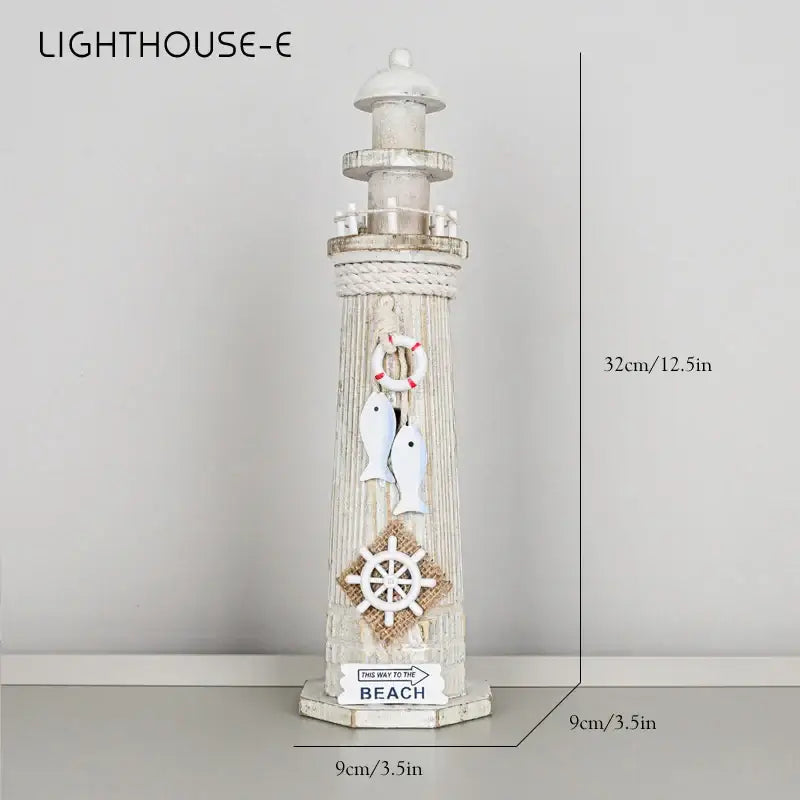 Coastal white and gray wooden ship model featuring distressed wood lighthouse with rope and nautical decorbites coastal wooden accents