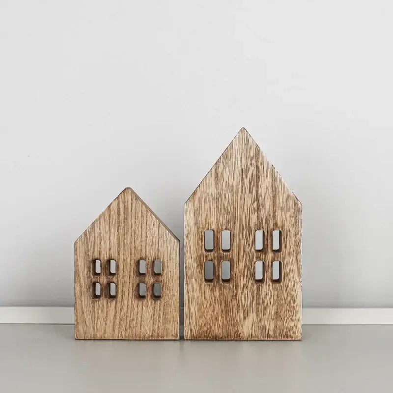 Two rustic wooden house-shaped decor pieces with natural grain and cut-out windows for decorbites coastal wooden ship model display