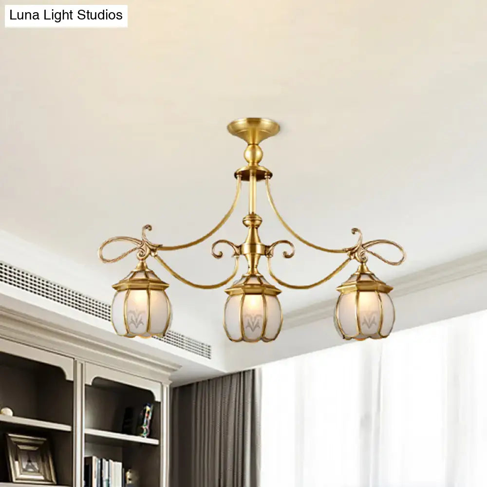 Brass-finished DecorBites colonial lantern island light fixture with three ivory glass lanterns for dining room suspension