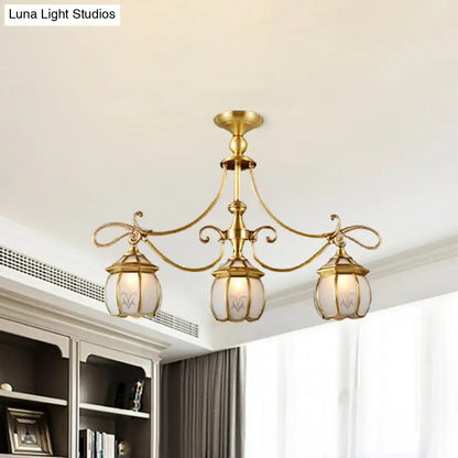 Brass-finished DecorBites colonial lantern island light fixture with three ivory glass lanterns for dining room suspension