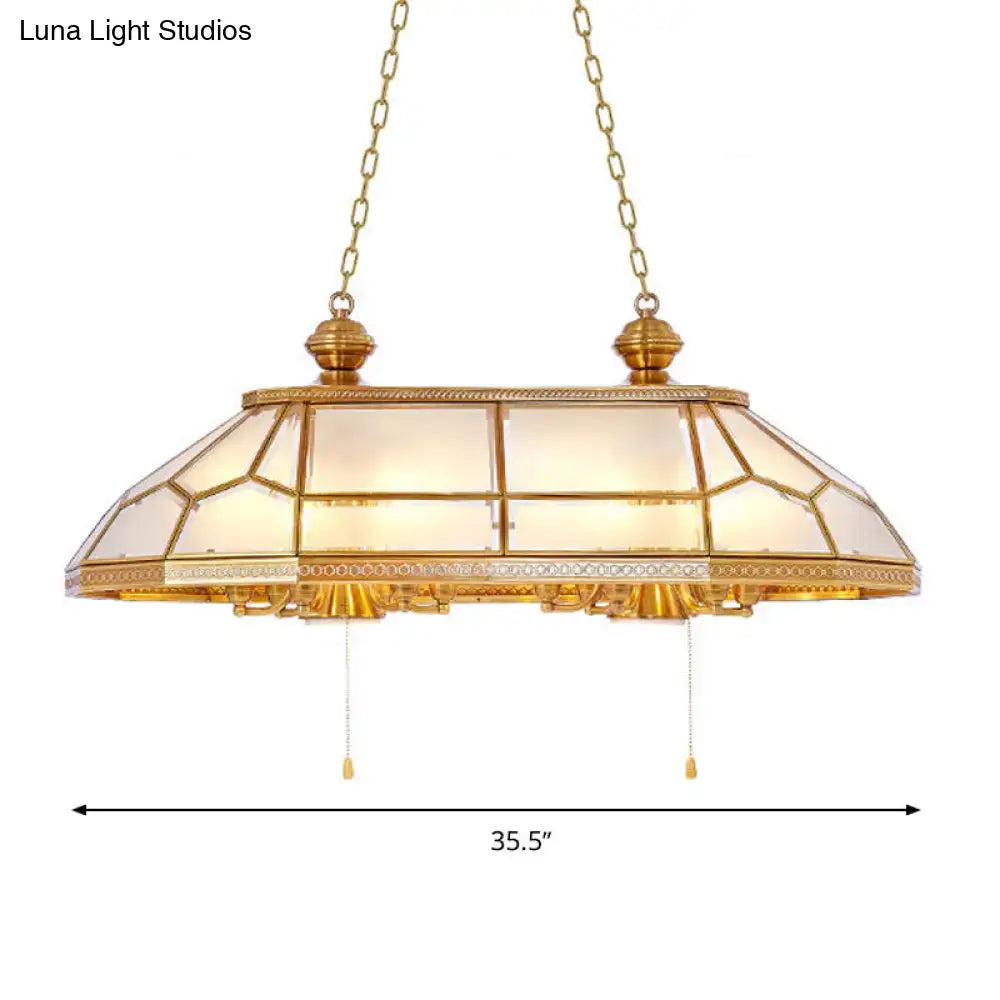 Gold-toned pendant table lamp with opal blown glass geometric stained-glass shade for living room decor