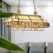 DecorBites™ colonial style pendant light with antique brass finish and amber cream stained glass panels featuring leaf motifs