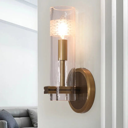 Colonialist Gold Wall Sconce with Clear Cylindrical Glass - Perfect for Living Room Lighting
