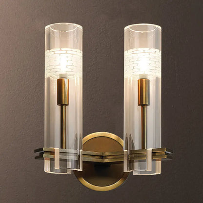 Colonialist Gold Wall Sconce with Clear Cylindrical Glass - Perfect for Living Room Lighting