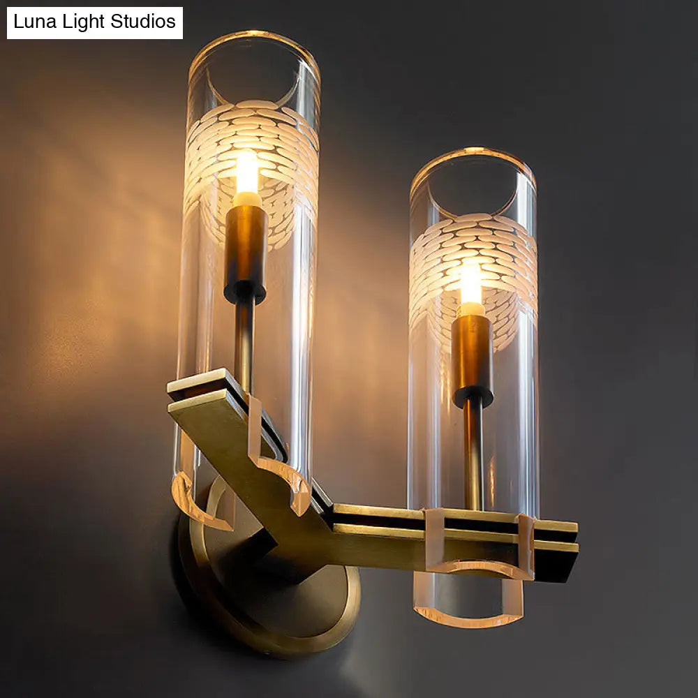 Colonialist Gold Wall Sconce with Clear Cylindrical Glass - Perfect for Living Room Lighting