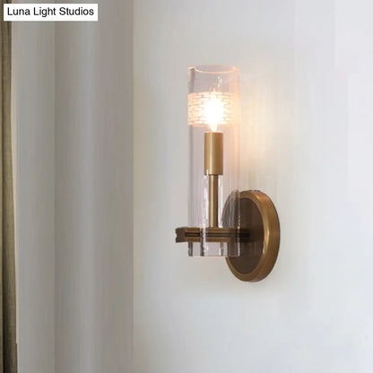 Colonialist Gold Wall Sconce with Clear Cylindrical Glass - Perfect for Living Room Lighting