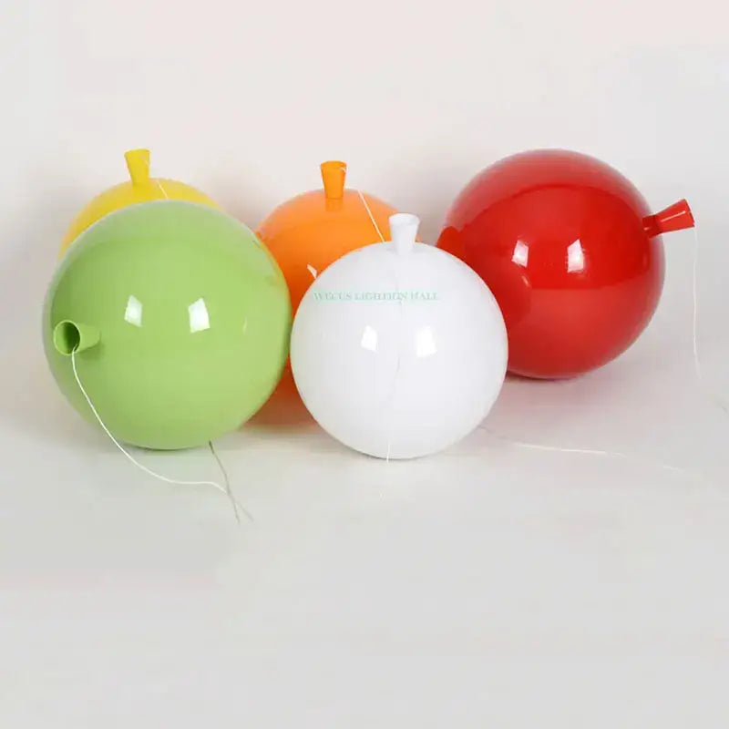 Glossy colorful balloon ceiling light in green orange red and white by decorbites ideal for bedroom and nursery decor