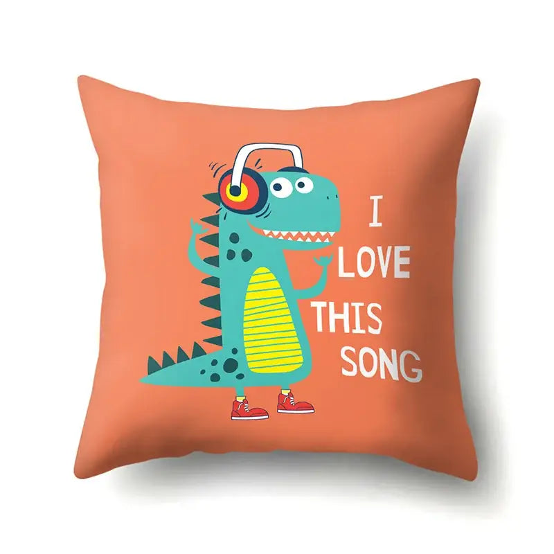 Orange decorbites dino baby pillowcase featuring a cartoon dinosaur with headphones and the text i love this song