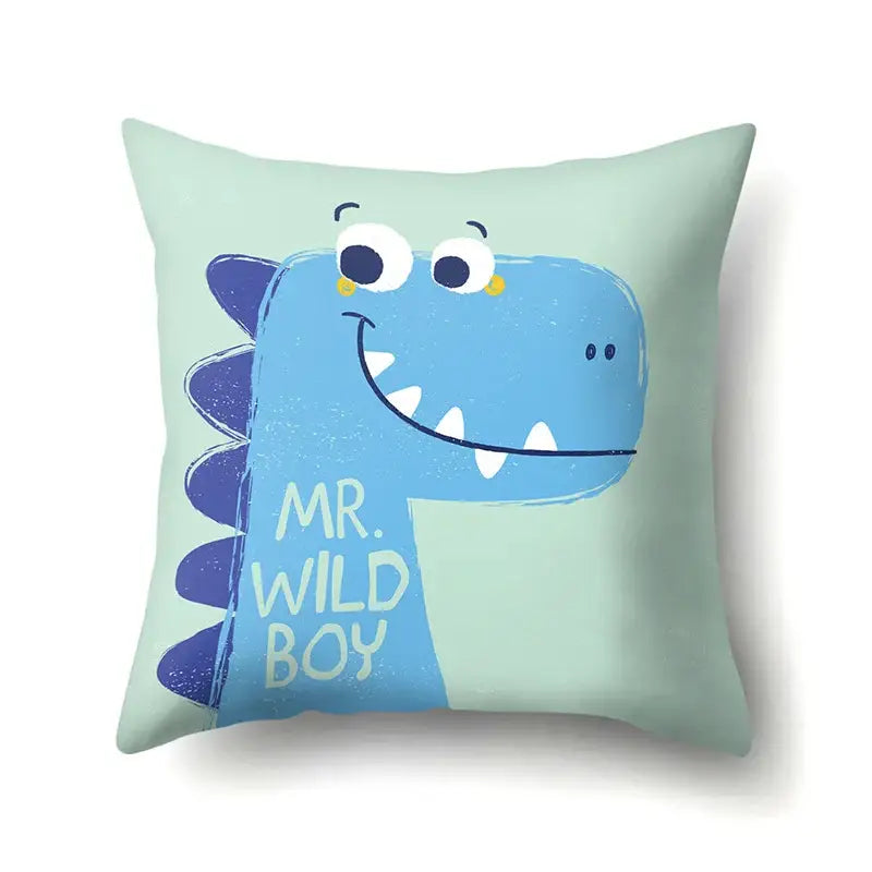 A soft mint green dino baby pillowcase by decorbites featuring a cheerful blue cartoon dinosaur with purple spines