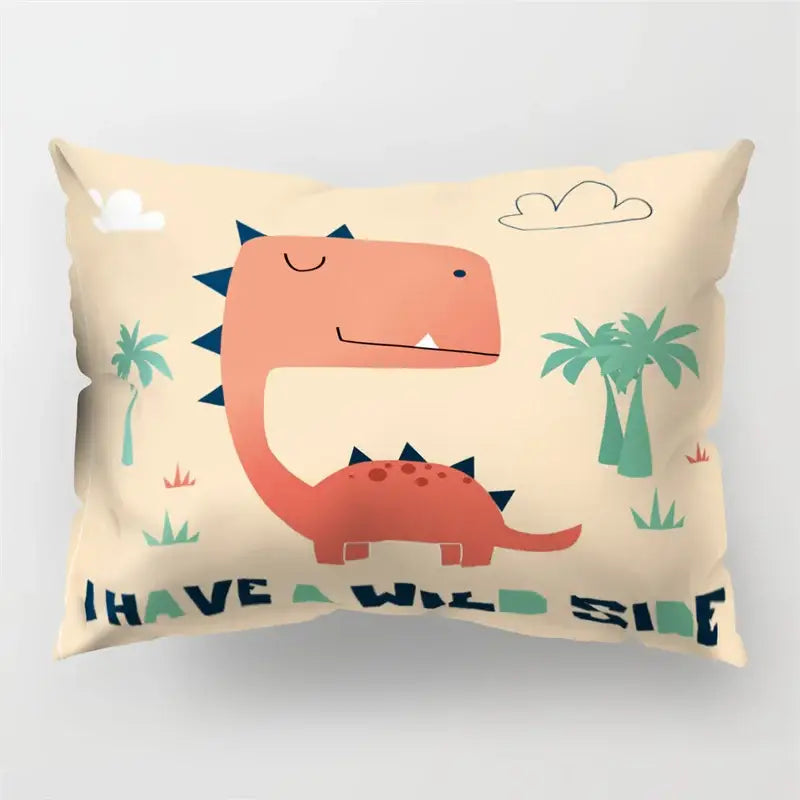 Beige cartoon dinosaur pillowcase featuring an orange dinosaur with blue spikes surrounded by palm trees and clouds for kids decorbites cartoon dinosaur bedroom decor