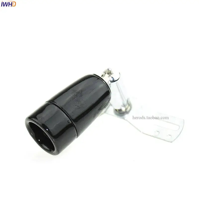 Black cylindrical magnetic connector with metallic clasp and bracket on decorbites ceramic e14 socket bulb holder back side