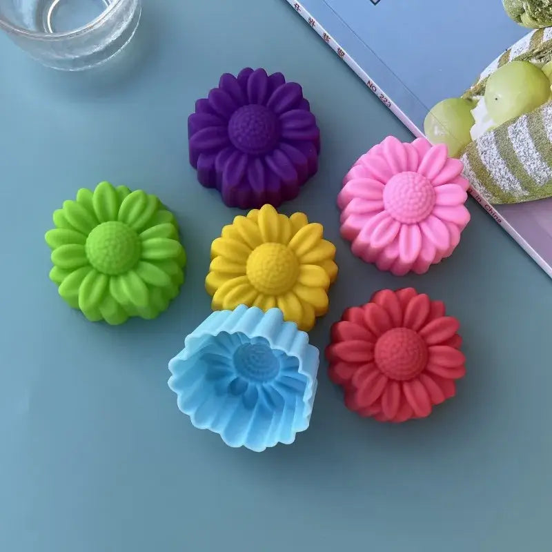 Colorful daisy silicone cake mold set with purple, pink, yellow, green, blue, and red silicone cake baking molds