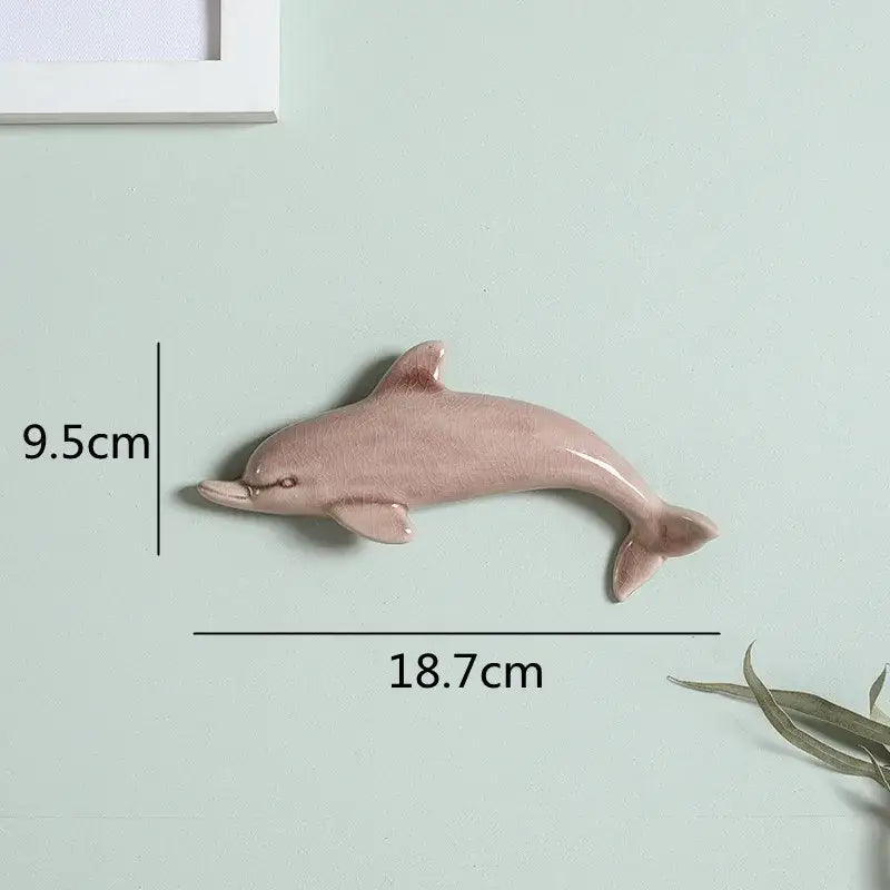 Glossy pink ceramic dolphin fish ocean wall decoration with smooth curves for childrens room decorbites dolphin fish design